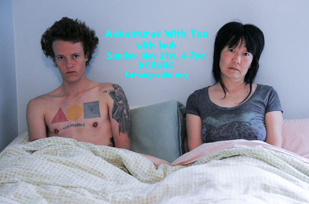 photo of laub and Jennifer Moon sitting in bed, Adventures With You, episode 10